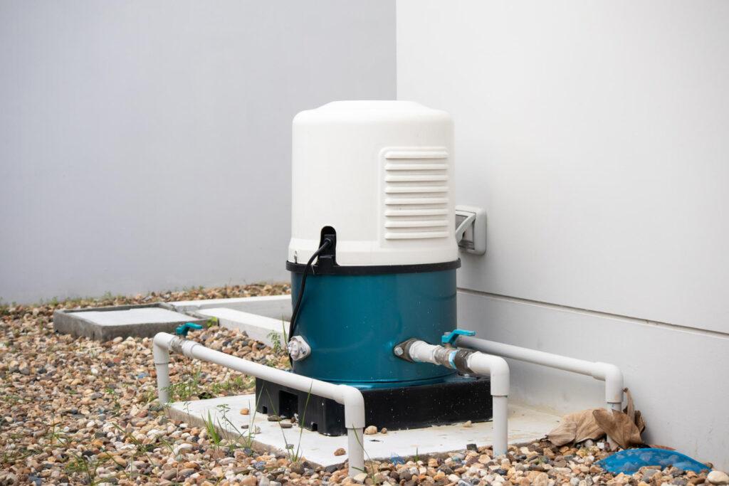 Water pump installed outside a building